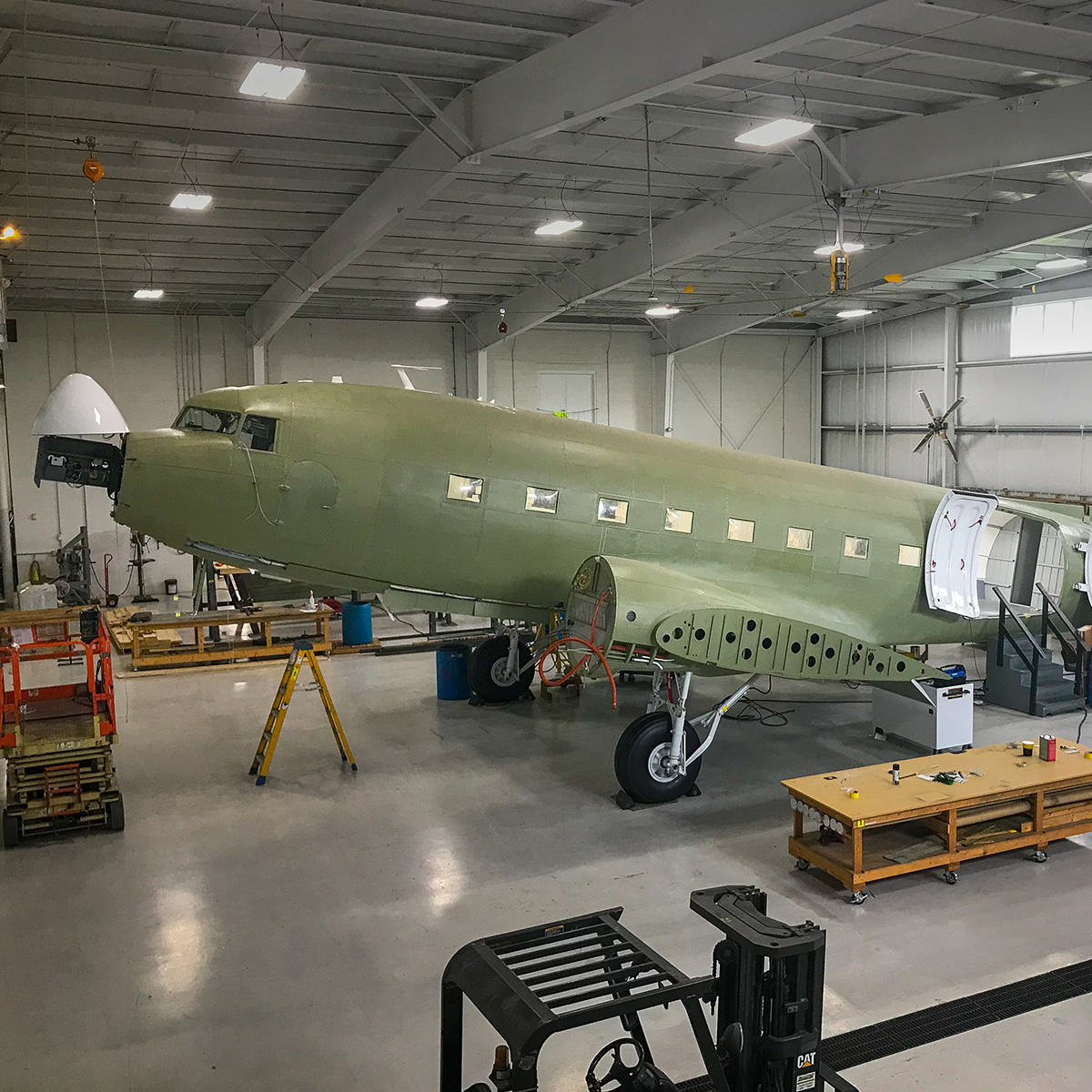 New turbine DC-3 nearly completed with new aluminum skin.